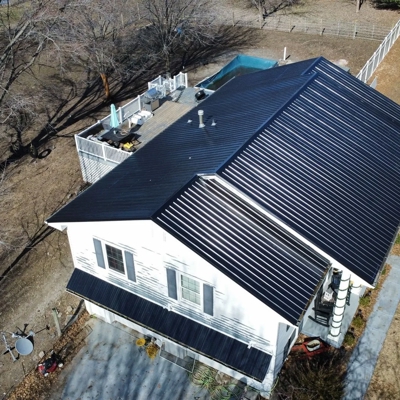 Metal Roof Installation – Shiny Black Metal